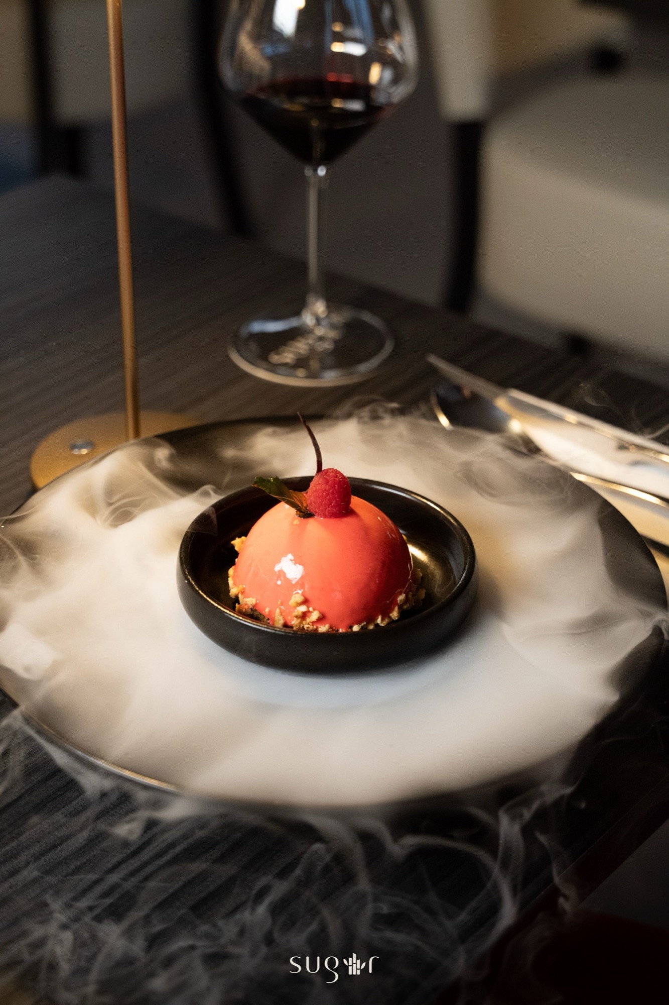 Dessert served on a cloud of dry ice